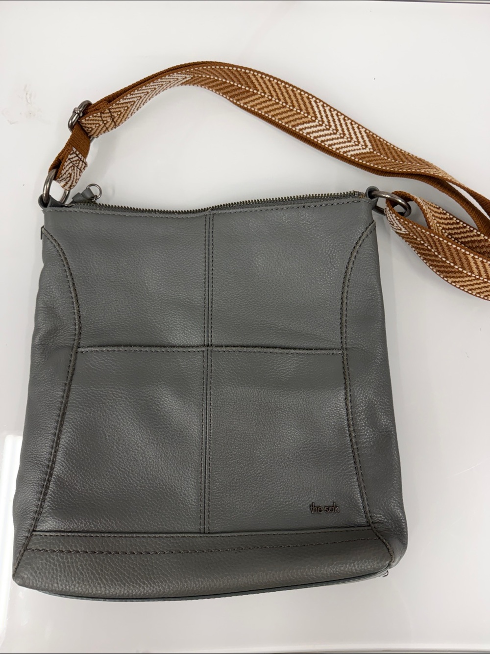 The Sak Gray Leather Crossbody with Brown Woven Strap